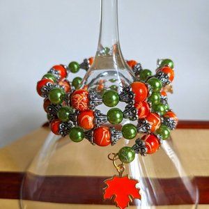 Orange and green fall fashion beaded memory wire bracelet